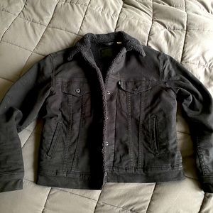 Levi’s black denim trucker jacket Sherpa lined
